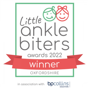 Logo green box with red sash and words winner for Yarnton Magic Garden winning Little Ankle Biters Award for Best Soft Play 2022