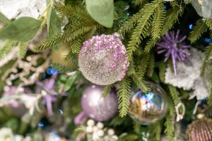 Baubles in silver and lilacs on a tree at Yarnton Home & Garden